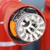 Close-up detail of primary tulip contact inside the insulating cylinder of 12kV vacuum circuit breaker
