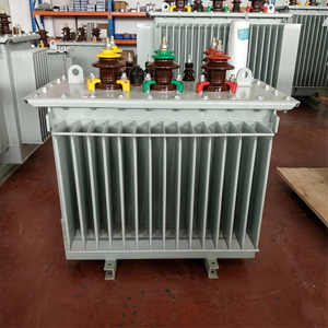 Front view of industrial-grade 2500kVA 10kV to 0.4kV 3-phase oil immersed distribution transformer with colored porcelain bushings