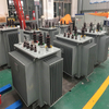 Side view showing robust corrugated cooling tank of 1600kVA 3-phase oil immersed distribution transformer