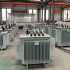 Rows of completed 200kVA fully sealed oil immersed distribution transformers in manufacturing facility